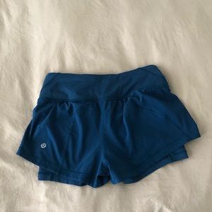 Blue Lululemon shorts with built-in spandex
